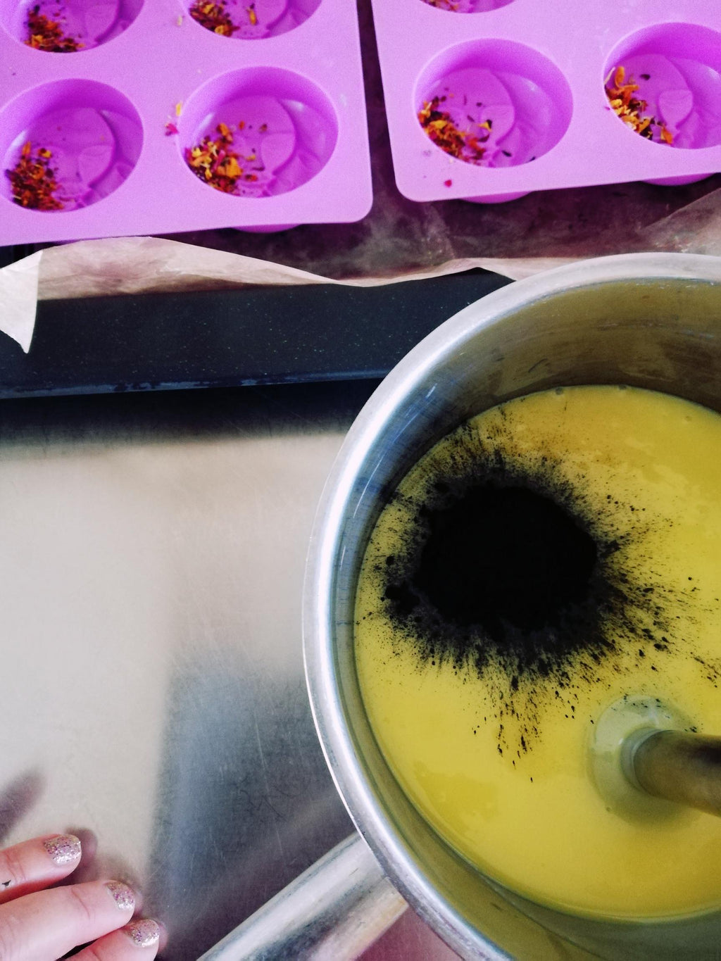 Handmade natural soap with oils, activated charcoal and lavandin floral water