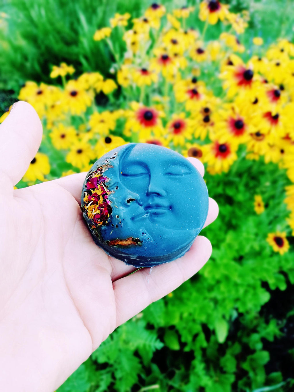Handmade natural soap with oils, activated charcoal and lavandin floral water
